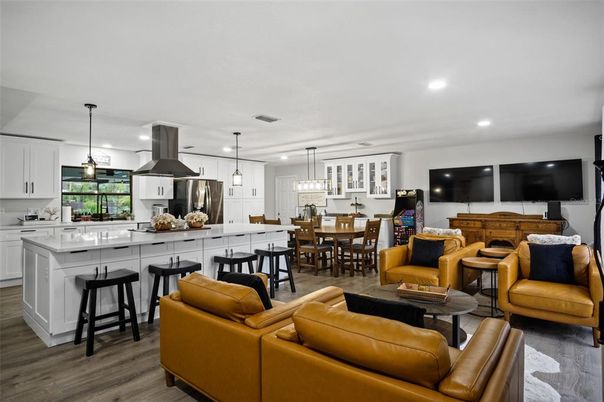 Dining room, Interior, Kitchen, Living room, Pendant Lights, Recessed Lighting, Stainless Steel Appliances, Wood Texture Flooring