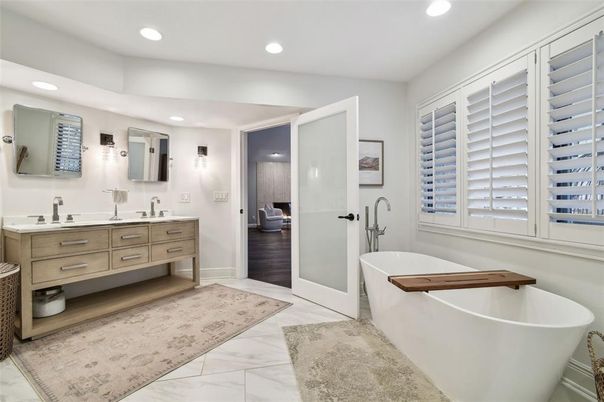 Bathroom, Dual Sink Vanities, Free Standing Baths, Interior, Marble, Recessed Lighting, Wood Texture Flooring