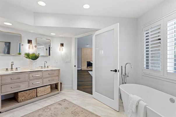 Bathroom, Dual Sink Vanities, Free Standing Baths, Interior, Marble, Recessed Lighting, Wood Texture Flooring