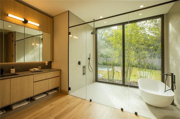 Bathroom, Free Standing Baths, Glass Shower, Interior, Recessed Lighting, Wood Texture Flooring