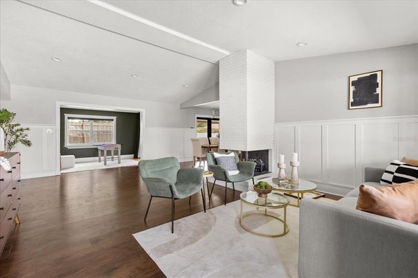 Fireplace, Game Room, Interior, Living room, Recessed Lighting, Wood Texture Flooring