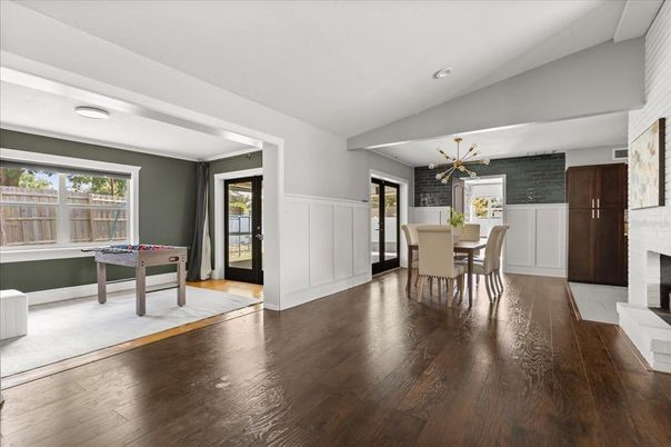 Billiard Table, Dining room, Fireplace, Game Room, Interior, Pendant Lights, Stone Walls, Wood Texture Flooring