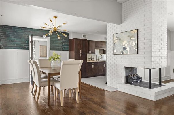 Dining room, Fireplace, Interior, Kitchen, Pendant Lights, Stone Walls, Wood Texture Flooring