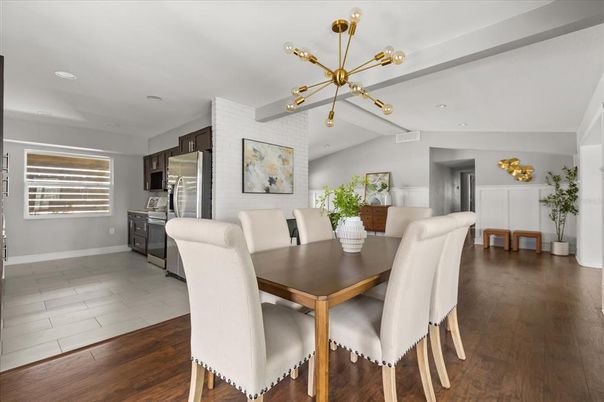Dining room, Interior, Kitchen, Pendant Lights, Recessed Lighting, Stainless Steel Appliances, Wood Texture Flooring