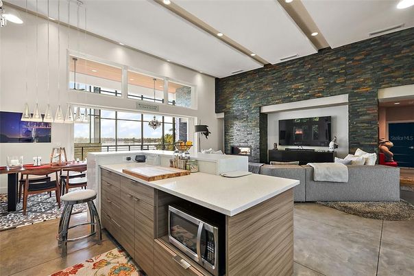 Dining room, Fireplace, Interior, Kitchen, Living room, Pendant Lights, Recessed Lighting, Stone Walls, Wood Texture Flooring