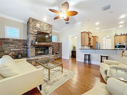 Fireplace, Interior, Kitchen, Living room, Recessed Lighting, Stone Walls, Wood Texture Flooring