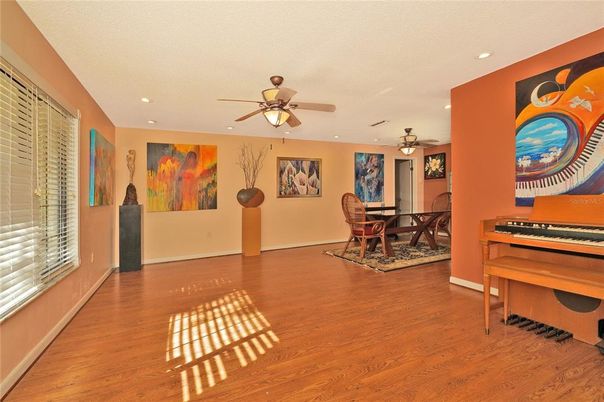 Dining room, Interior, Piano, Recessed Lighting, Wood Texture Flooring