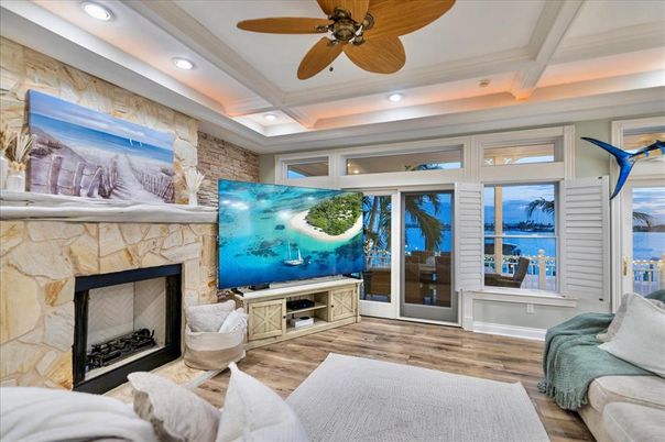 Fireplace, Interior, Living room, Recessed Lighting, Stone Walls, Wood Texture Flooring