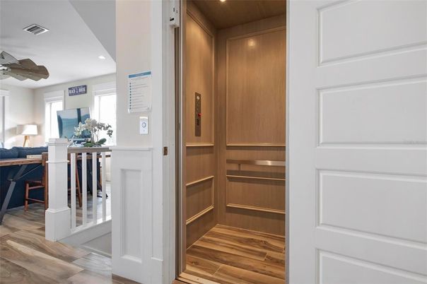 Elevator, Interior, Recessed Lighting, Wooden Ceilings, Wood Texture Flooring, Wooden Walls