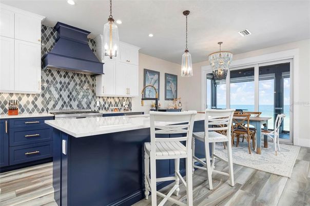 Chandelier, Dining room, Interior, Kitchen, Pendant Lights, Recessed Lighting, Water, Wood Texture Flooring