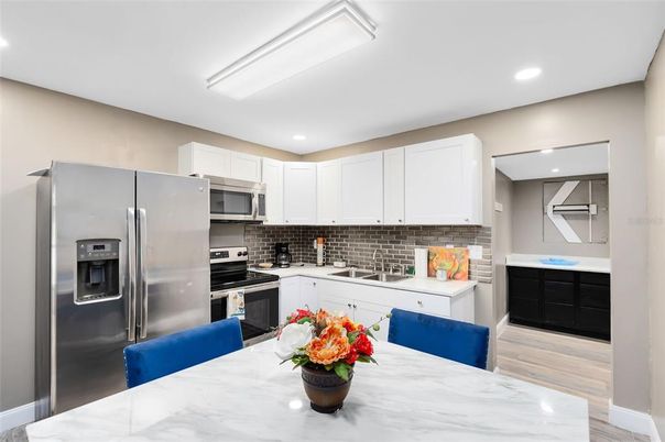 Interior, Kitchen, Recessed Lighting, Stainless Steel Appliances, Wood Texture Flooring