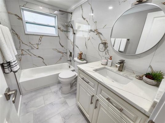 Bathroom, Dual Sink Vanities, Interior, Marble, Marble Walls, Recessed Lighting