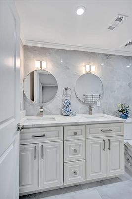 Bathroom, Dual Sink Vanities, Interior, Marble Walls, Recessed Lighting