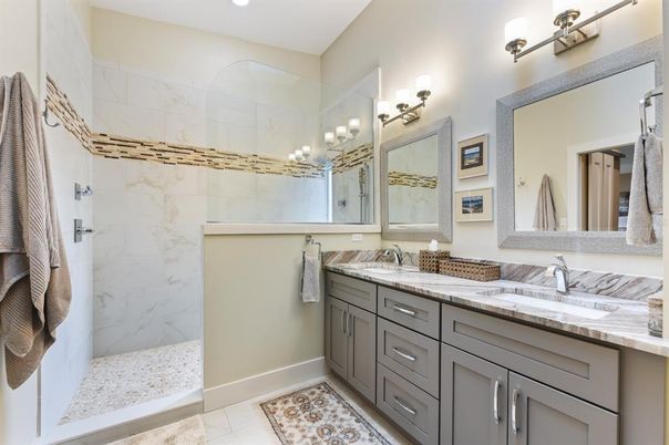 Bathroom, Dual Sink Vanities, Glass Shower, Interior, Marble Walls, Recessed Lighting