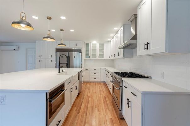 Interior, Kitchen, Pendant Lights, Recessed Lighting, Stainless Steel Appliances, Wood Texture Flooring