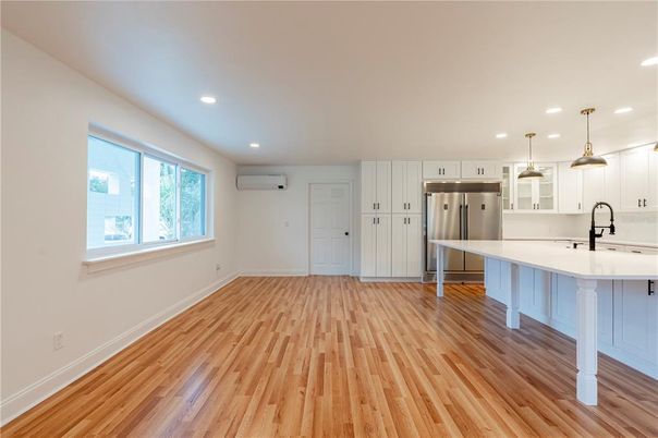 Interior, Kitchen, Pendant Lights, Recessed Lighting, Stainless Steel Appliances, Wood Texture Flooring