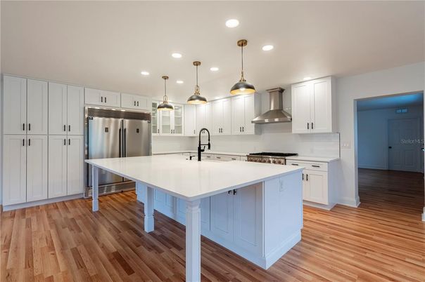 Interior, Kitchen, Pendant Lights, Recessed Lighting, Stainless Steel Appliances, Wood Texture Flooring