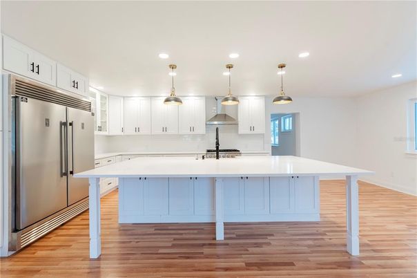 Interior, Kitchen, Pendant Lights, Recessed Lighting, Stainless Steel Appliances, Wood Texture Flooring