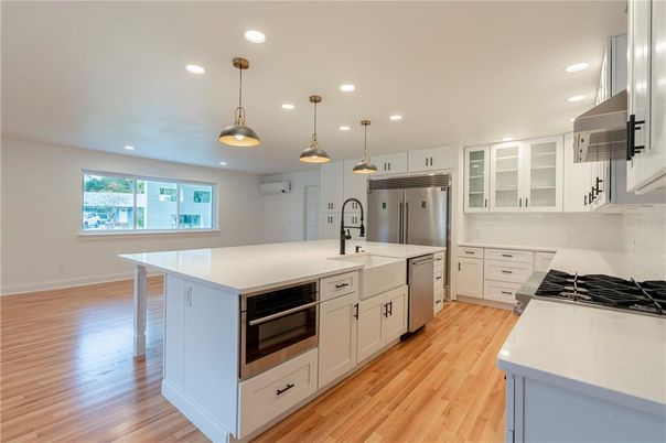 Interior, Kitchen, Pendant Lights, Recessed Lighting, Stainless Steel Appliances, Wood Texture Flooring