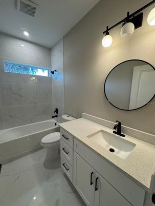 Bathroom, Dual Sink Vanities, Interior, Marble, Marble Walls, Recessed Lighting