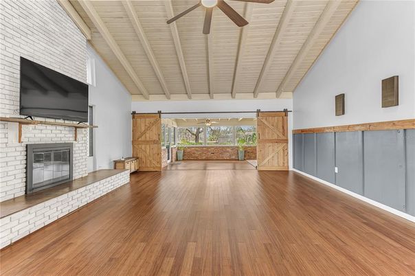 Empty room, Fireplace, Interior, Stone Walls, Wooden Ceilings, Wood Texture Flooring