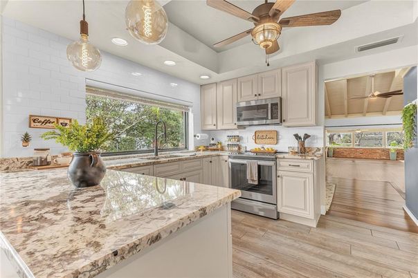 Interior, Kitchen, Pendant Lights, Recessed Lighting, Stainless Steel Appliances, Wood Texture Flooring