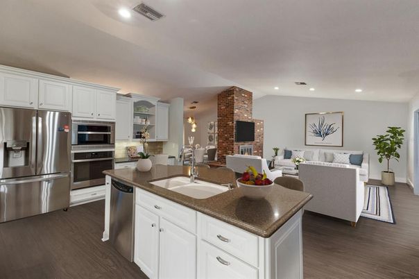 Dining room, Fireplace, Interior, Kitchen, Living room, Pendant Lights, Recessed Lighting, Stainless Steel Appliances, Stone Walls, Wood Texture Flooring
