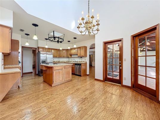 Chandelier, Interior, Kitchen, Pendant Lights, Stainless Steel Appliances, Wood Texture Flooring
