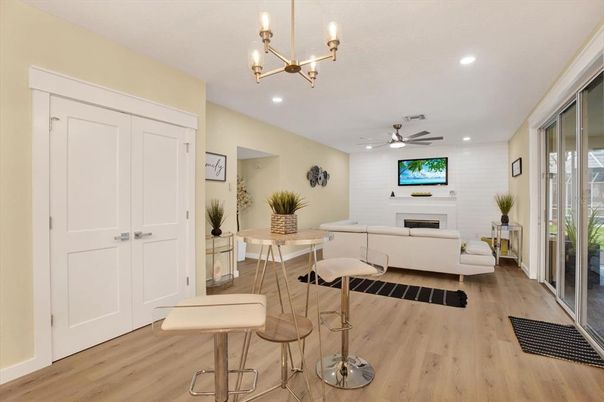 Fireplace, Interior, Living room, Recessed Lighting, Wood Texture Flooring