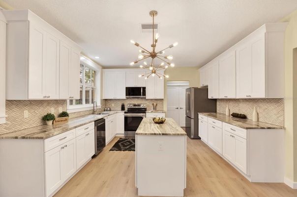 Interior, Kitchen, Pendant Lights, Recessed Lighting, Stainless Steel Appliances, Wood Texture Flooring