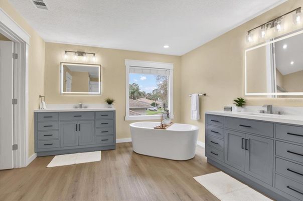 Bathroom, Dual Sink Vanities, Free Standing Baths, Interior, Recessed Lighting, Wood Texture Flooring
