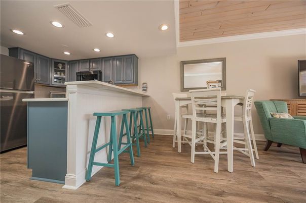 Dining room, Interior, Kitchen, Recessed Lighting, Stainless Steel Appliances, Wooden Ceilings, Wood Texture Flooring
