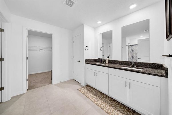 Bathroom, Dual Sink Vanities, Interior, Recessed Lighting, Walk-in Closets