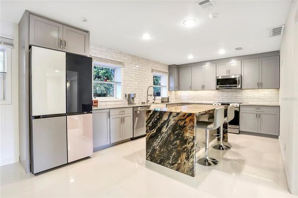 Interior, Kitchen, Recessed Lighting, Stainless Steel Appliances, Stone Walls