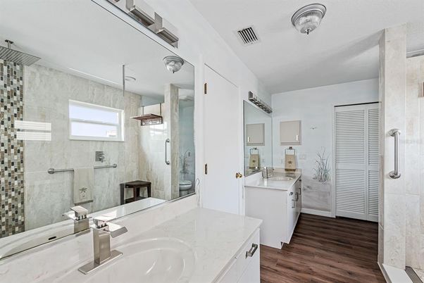 Bathroom, Dual Sink Vanities, Glass Shower, Interior, Wood Texture Flooring
