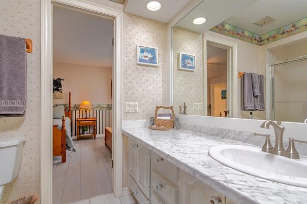 Bathroom, Dual Sink Vanities, Interior, Recessed Lighting, Wood Texture Flooring