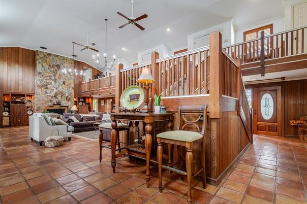 Chandelier, Fireplace, Interior, Living room, Pendant Lights, Recessed Lighting, Stone Walls