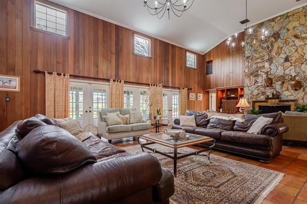 Chandelier, Fireplace, Interior, Living room, Pendant Lights, Stone Walls, Wooden Walls