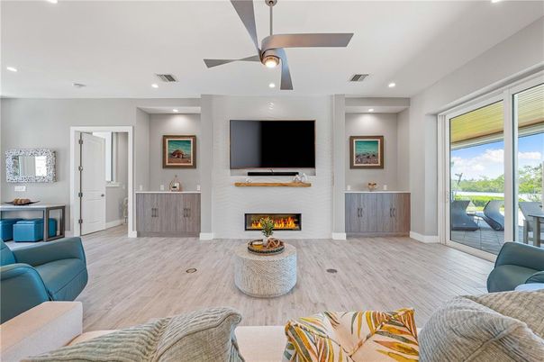 Fireplace, Interior, Living room, Recessed Lighting, Wood Texture Flooring