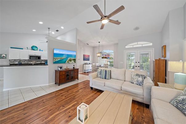 Dining room, Interior, Kitchen, Living room, Pendant Lights, Recessed Lighting, Stainless Steel Appliances, Wood Texture Flooring