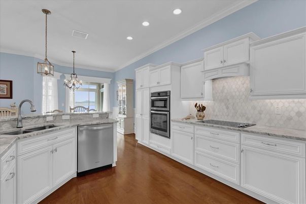 Chandelier, Interior, Kitchen, Pendant Lights, Recessed Lighting, Stainless Steel Appliances, Wood Texture Flooring