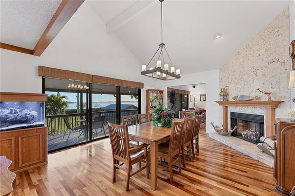 Chandelier, Dining room, Fireplace, Interior, Pendant Lights, Recessed Lighting, Wood Texture Flooring