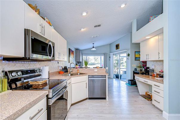 Interior, Kitchen, Recessed Lighting, Stainless Steel Appliances, Wood Texture Flooring
