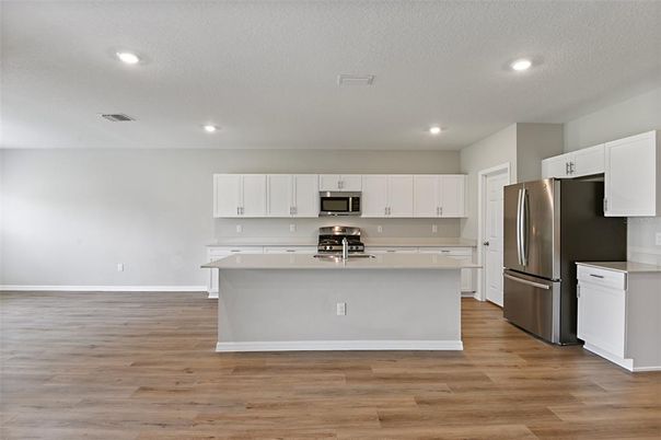 Interior, Kitchen, Recessed Lighting, Stainless Steel Appliances, Wood Texture Flooring