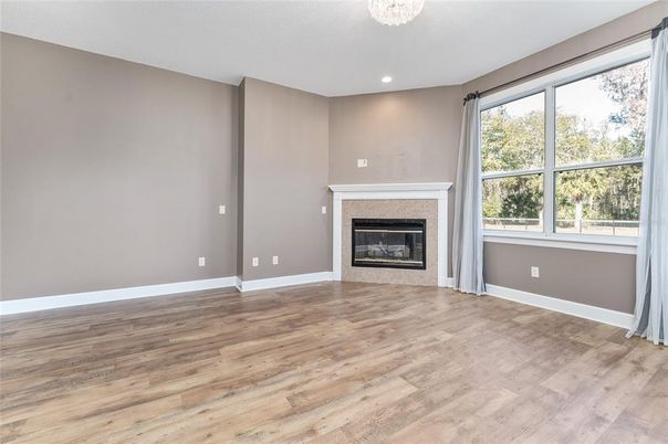 Empty room, Fireplace, Interior, Recessed Lighting, Wood Texture Flooring