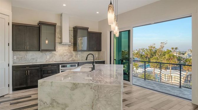 Interior, Kitchen, Marble Walls, Pendant Lights, Recessed Lighting, Wood Texture Flooring