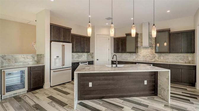 Interior, Kitchen, Marble Walls, Pendant Lights, Recessed Lighting, Wood Texture Flooring