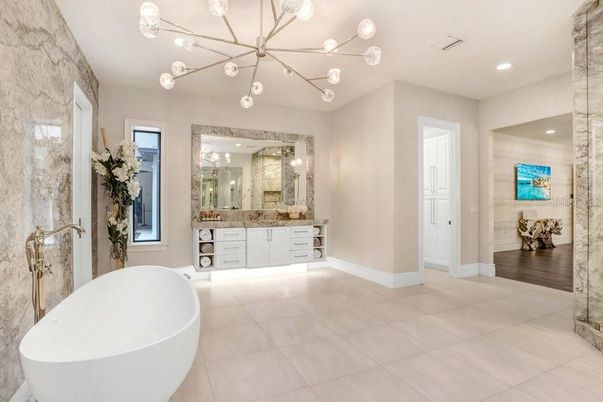 Bathroom, Dual Sink Vanities, Free Standing Baths, Interior, Pendant Lights, Recessed Lighting, Wood Texture Flooring