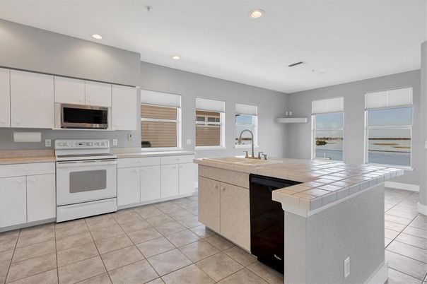 Interior, Kitchen, Recessed Lighting, Tile Countertops