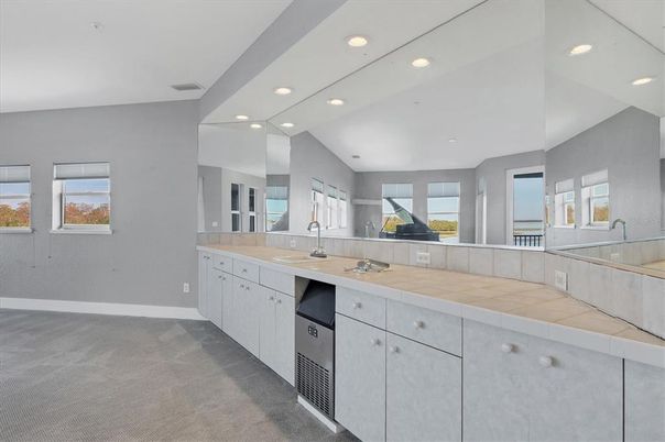 Bathroom, Dual Sink Vanities, Interior, Recessed Lighting, Tile Countertops